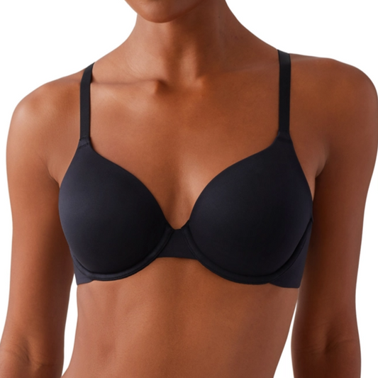 Woman wearing a black bra on a white background