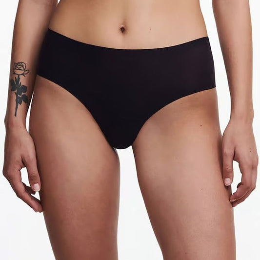 Person wearing black underwear on a white background
