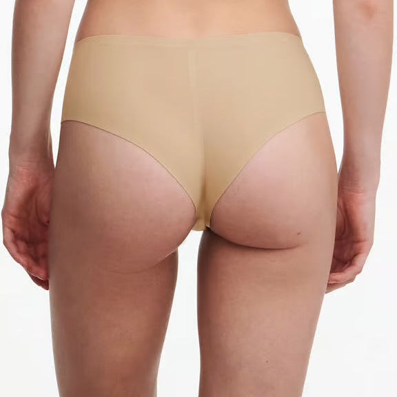 Beige underwear on a white background