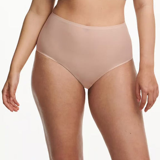 Beige high-waisted underwear worn by a model on a white background
