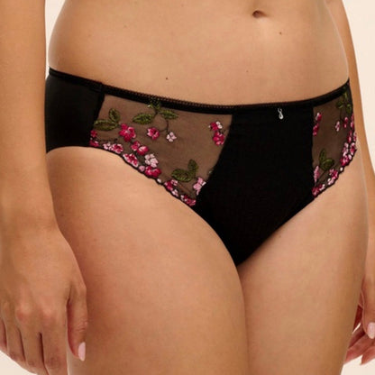 Black mesh and satin briefs with pink and green floral embroidery on the side panels, shown on a model.