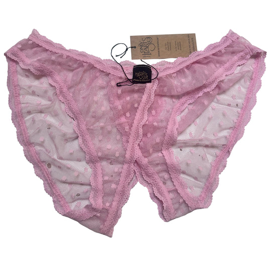 Pink sheer ouvert mesh lace undie with a polka dot pattern, laid flat on a white surface with a paper tag attached.